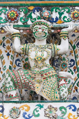 Statue of a Demon supporting a Prang at Wat Arun
