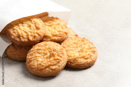 Paper bag with Danish butter cookies on table