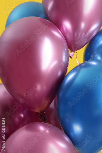 Bunch of bright balloons, closeup view. Party objects