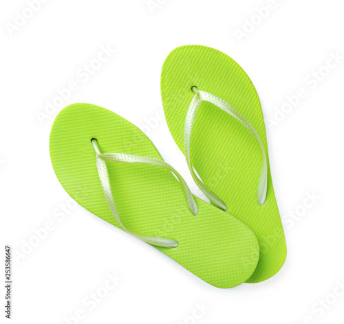 Bright flip flops on white background, top view. Beach accessories