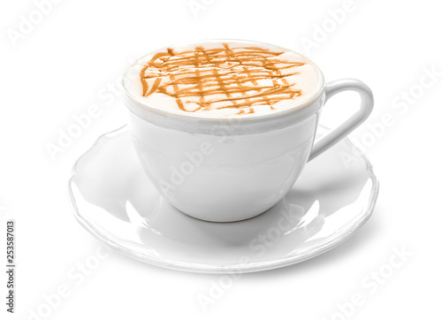 Cup of tasty caramel macchiato on white background