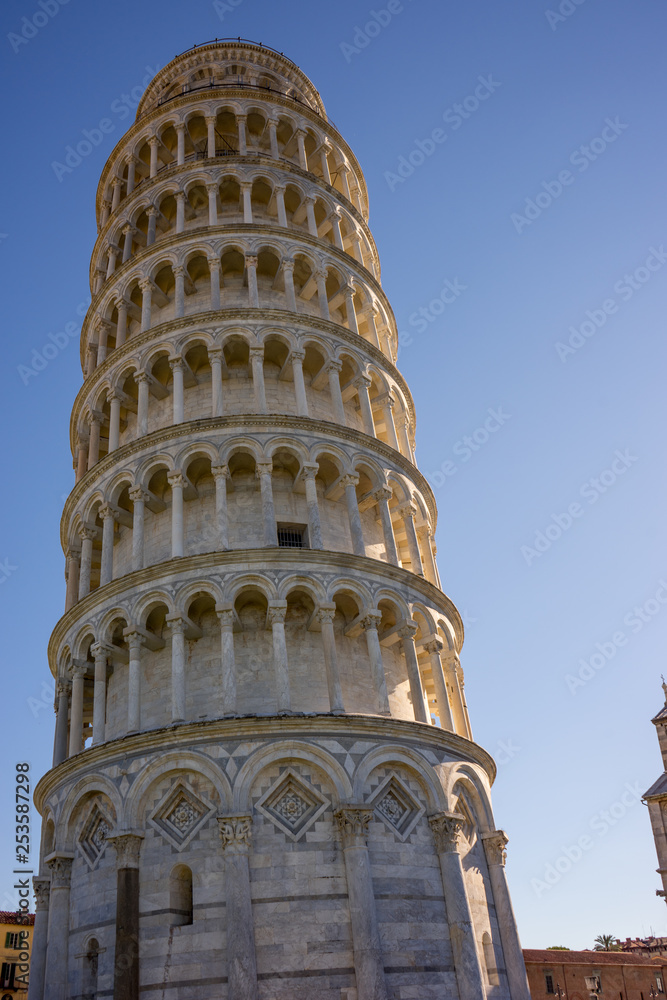 The leaning tower of pisa at Piazza del Miracoli Duomo square,Camposanto cemetery in Tuscany, Italy