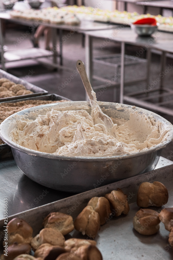 Fototapeta premium Unsanitary production of cookies on factory. Dirty production with disabilities