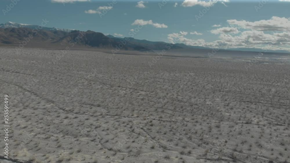 Flying pull back over sparse Nevada desert vegetation-Aerial Flying pull back over sparse Nevada desert vegetation-Aerial