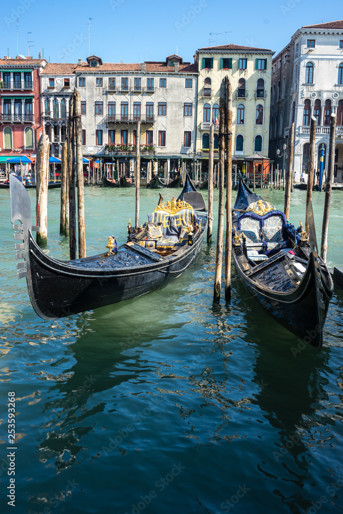 The gondolas parked along the grand canal Venice Design in Venice, Italy The gondolas parked along the grand canal Venice Design in Venice, Italy