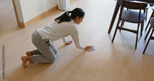 Asian Housewife woman wash the floor with rag