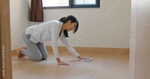 Asian Woman clean the floor at home prepare for lunar new year