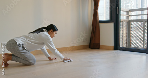 Woman clean the floor at home