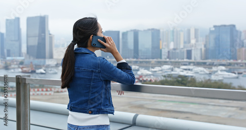 Photography Woman talk to mobile phone in city