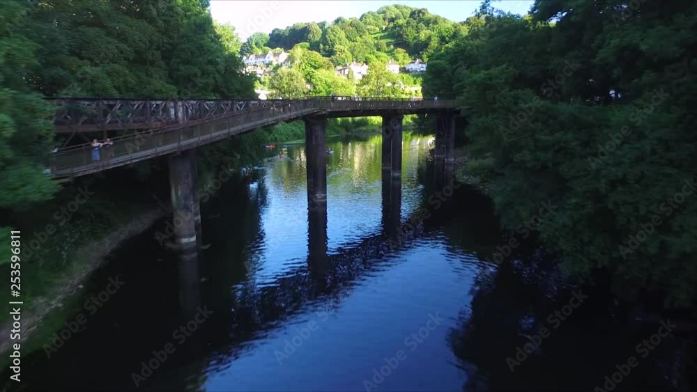 Arial view of railway bridge, Kayakers & Paddle boarders underneath. Arial view of railway bridge, Kayakers & Paddle boarders underneath.