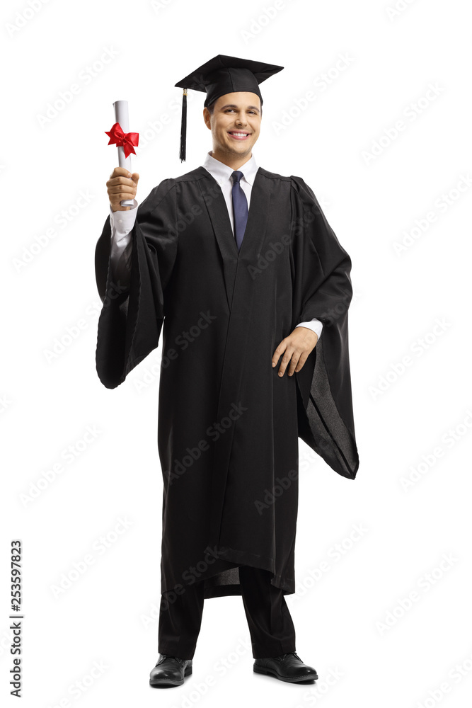 Young man in a black graduation gown and cap holding a diploma Stock Photo  | Adobe Stock
