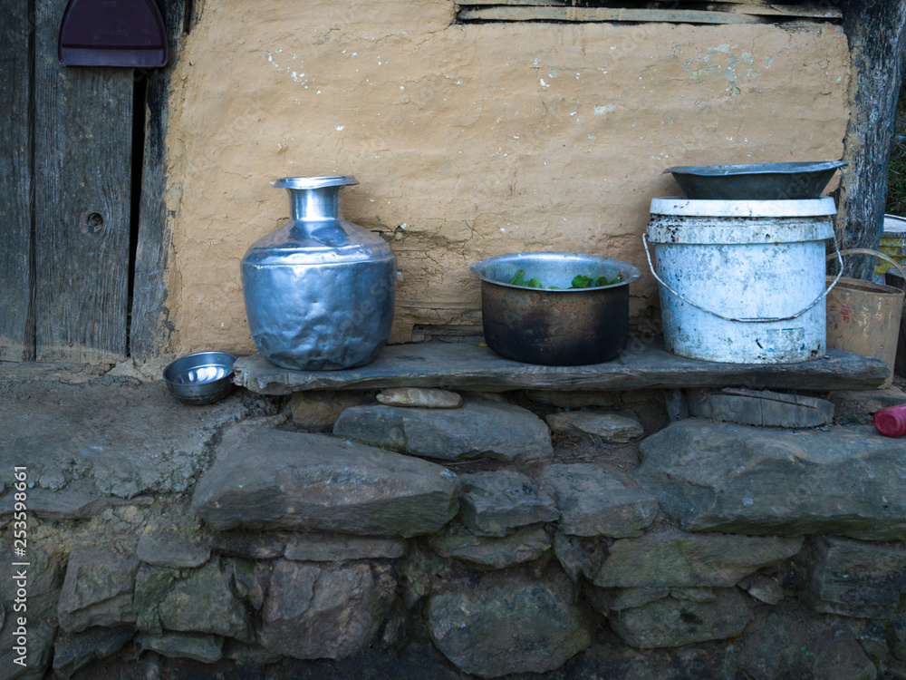 Fototapeta premium Utensils outside traditional hut, Rinchenpong, Sikkim, India
