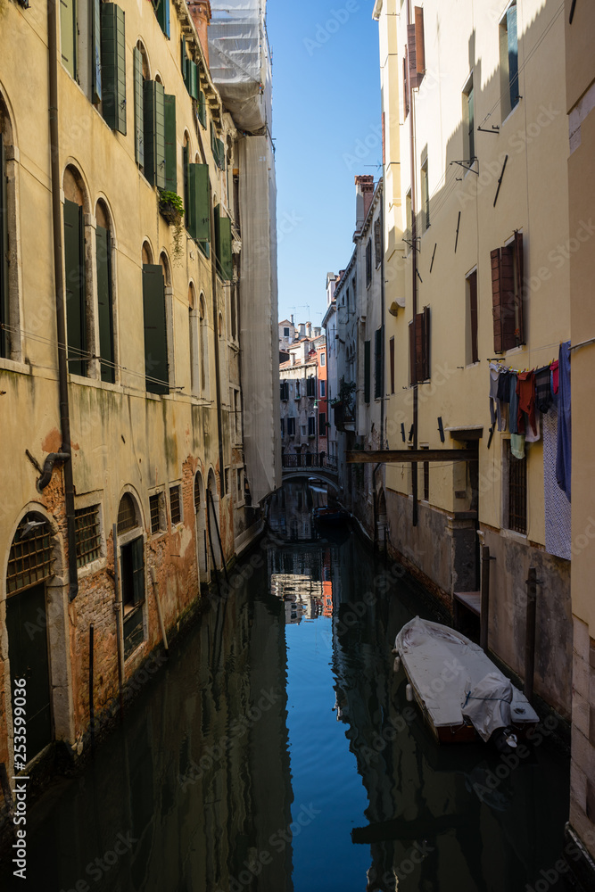 Italy, Venice, Venice, CANAL PASSING THROUGH CITY BUILDINGS