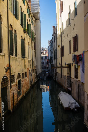 Italy, Venice, Venice, CANAL PASSING THROUGH CITY BUILDINGS © SkandaRamana