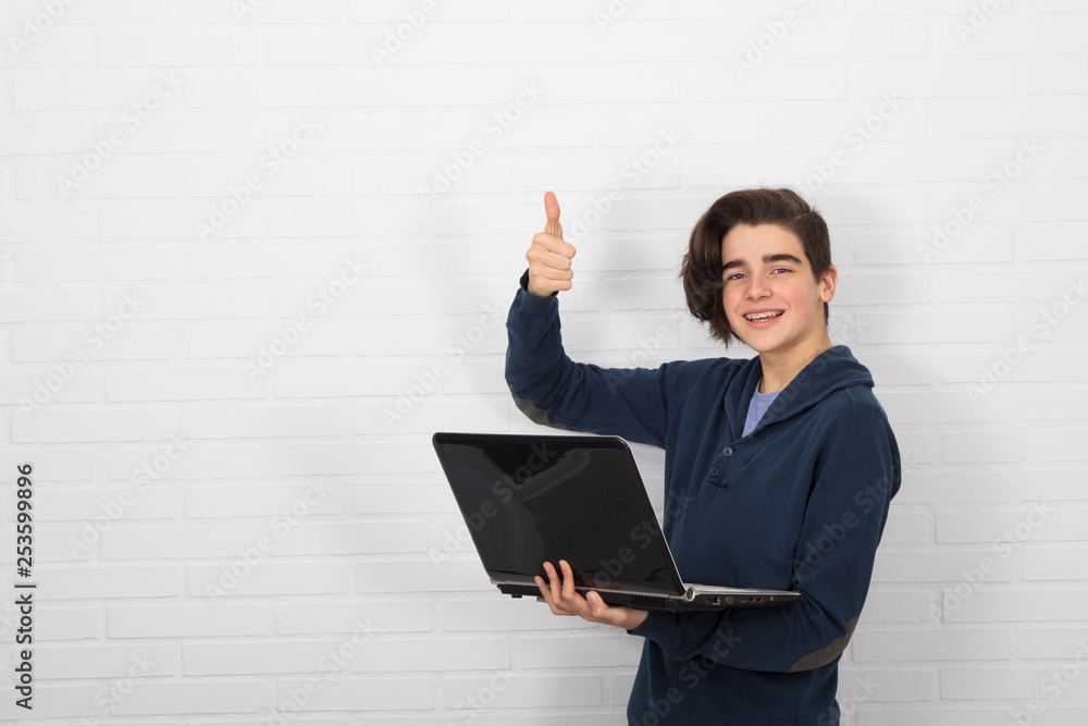 young teenager or isolated student with laptop young teenager or isolated student with laptop