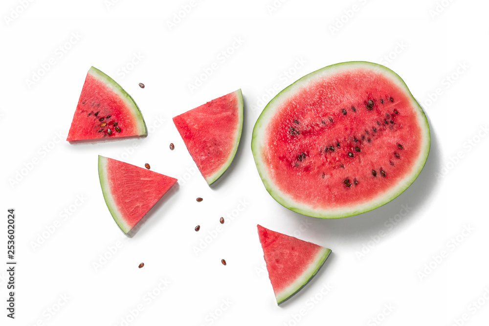 Slices of Fresh Watermelon, watermelon grains, half a watermelon on a white isolated background. Flat lay, top view Slices of Fresh Watermelon, watermelon grains, half a watermelon on a white isolated background. Flat lay, top view