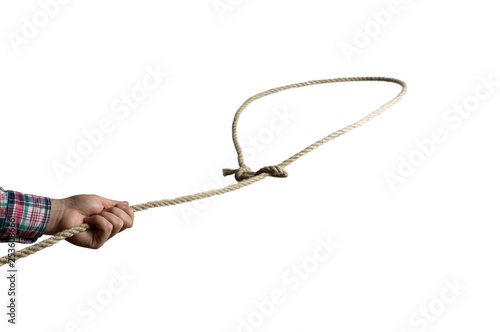 A lasso loop in the hands of a person, close-up on isolated white background.
