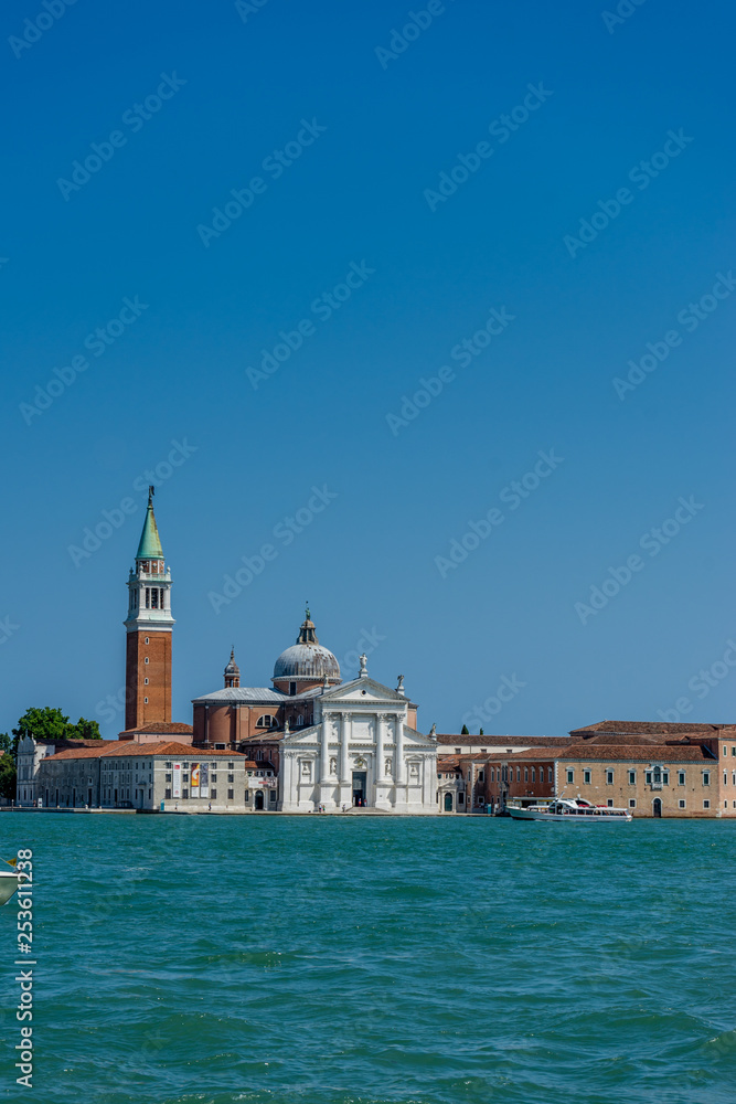 Italy, Venice, Church of San Giorgio Maggiore, VIEW OF BUILDINGS AGAINST BLUE SKY Italy, Venice, Church of San Giorgio Maggiore, VIEW OF BUILDINGS AGAINST BLUE SKY