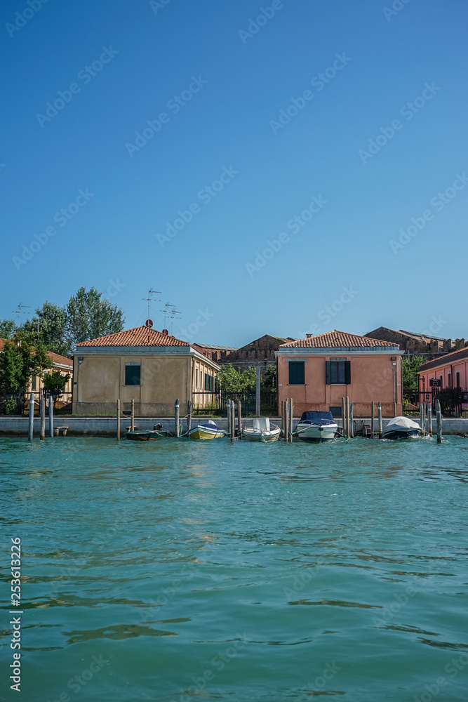 Italy, Venice, a large pool of water in front of a house