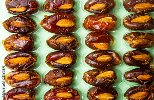 Fresh dates with almonds flat lay