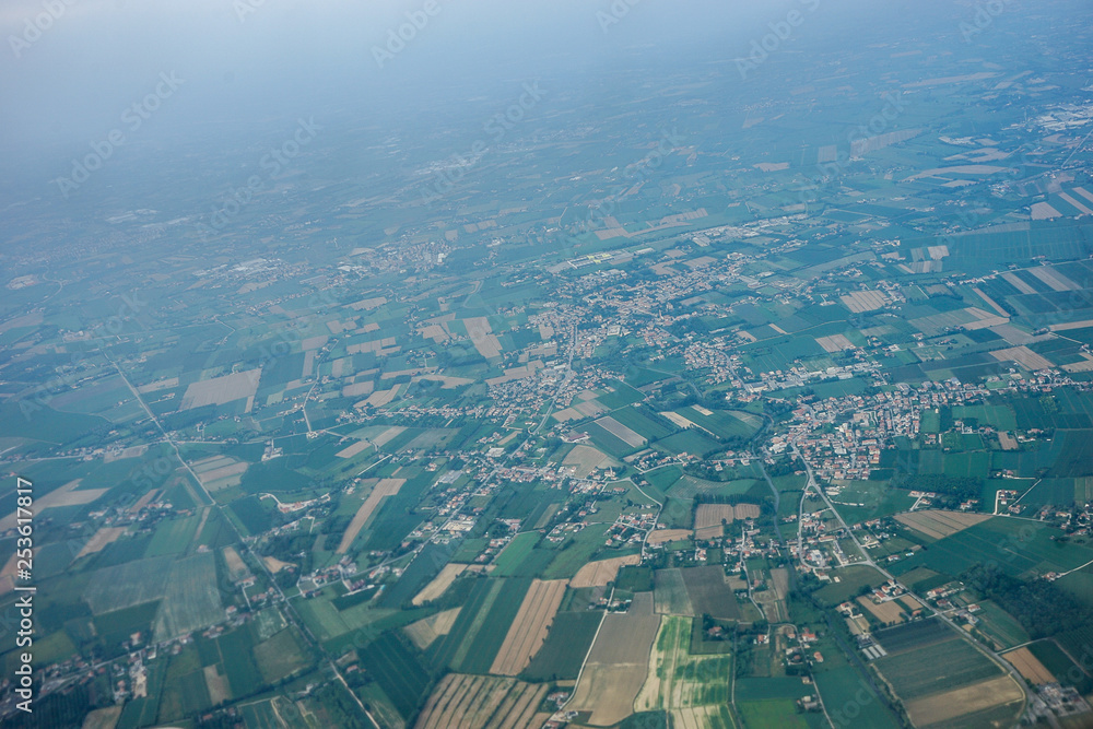 Fototapeta premium Italy, Venice, viewed from above from airplane window