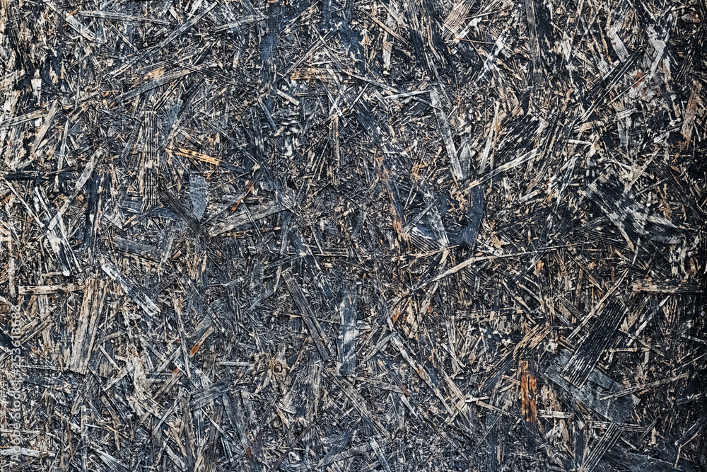 Charred particle Board. Grunge texture background Charred particle Board. Grunge texture background