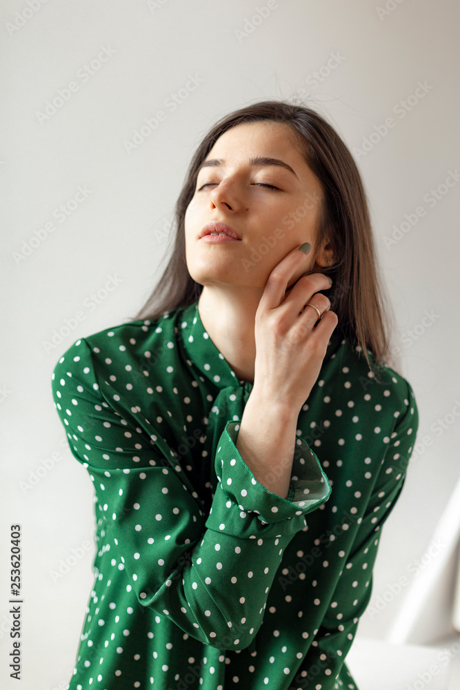 glamor stylish sexy beautiful young model girl in summer green casual hipster dress. High fashion look. glamor stylish sexy beautiful young model girl in summer green casual hipster dress. High fashion look.