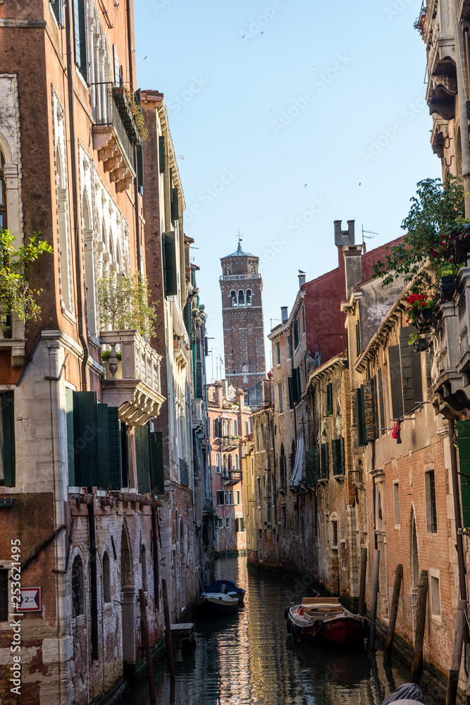 Italy, Venice, Italy, VIEW OF CANAL AMIDST BUILDINGS IN CITY