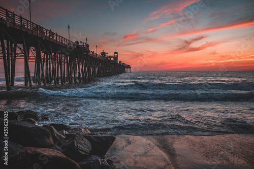 sunset on the beach and pier