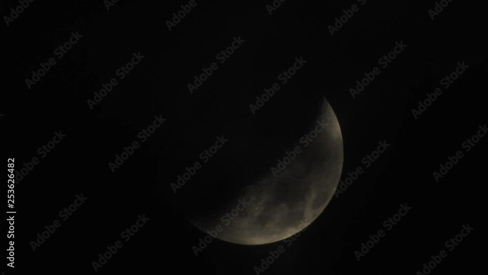 Moon in cloudy night sky Moon in cloudy night sky