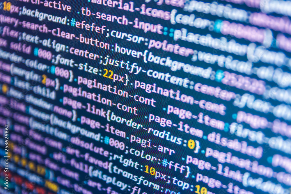 Neural network running in Python. Programmer working on his laptop ...