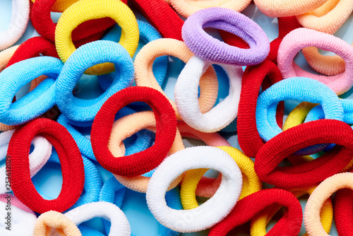 A pile of bright multi-colored scrunchy.