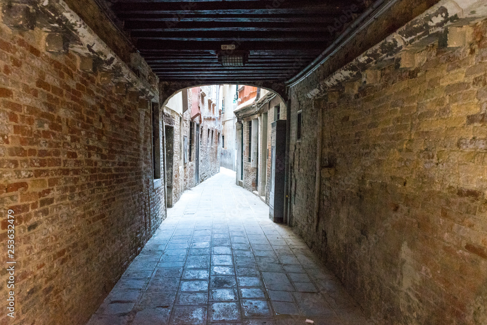 Italy, Venice, CORRIDOR OF OLD BUILDING narrow street empty