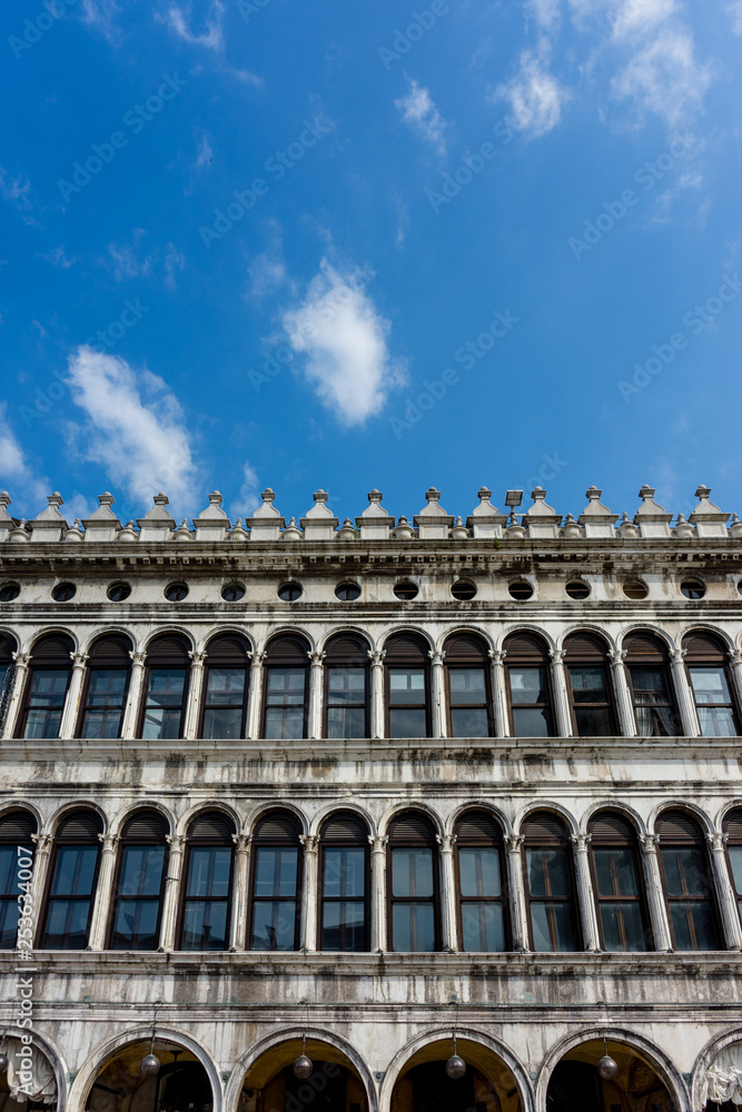 Italy, Venice, Piazza San Marco, LOW ANGLE VIEW OF BUILDING AGAINST BLUE SKY