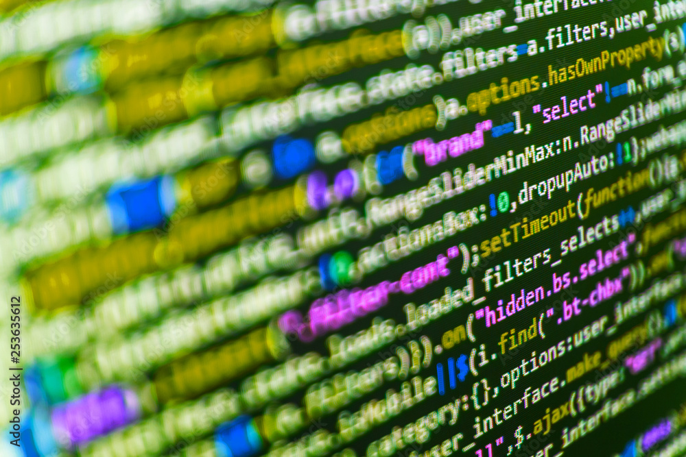 Programmer typing new lines of HTML code. Java Software engineer