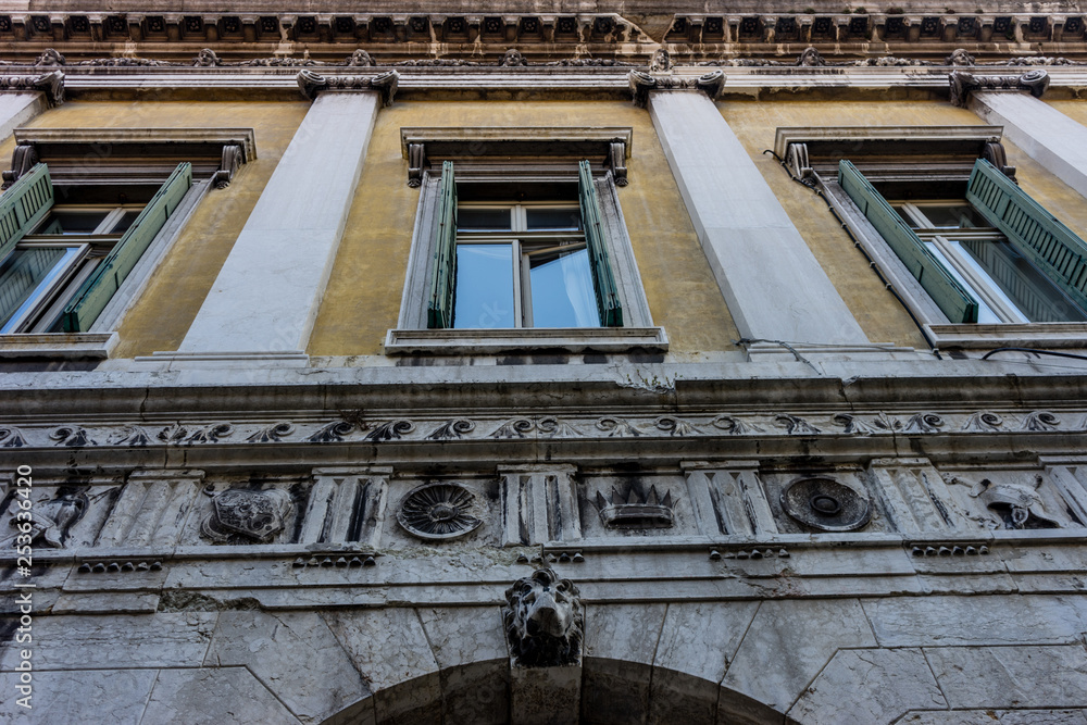 Italy, Venice, a large stone building with a clock Italy, Venice, a large stone building with a clock