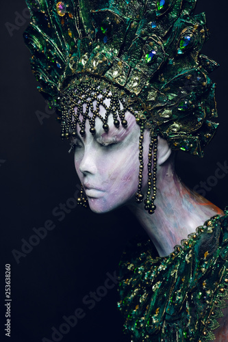 Head of woman mannequin in green decorated kokoshnick photo