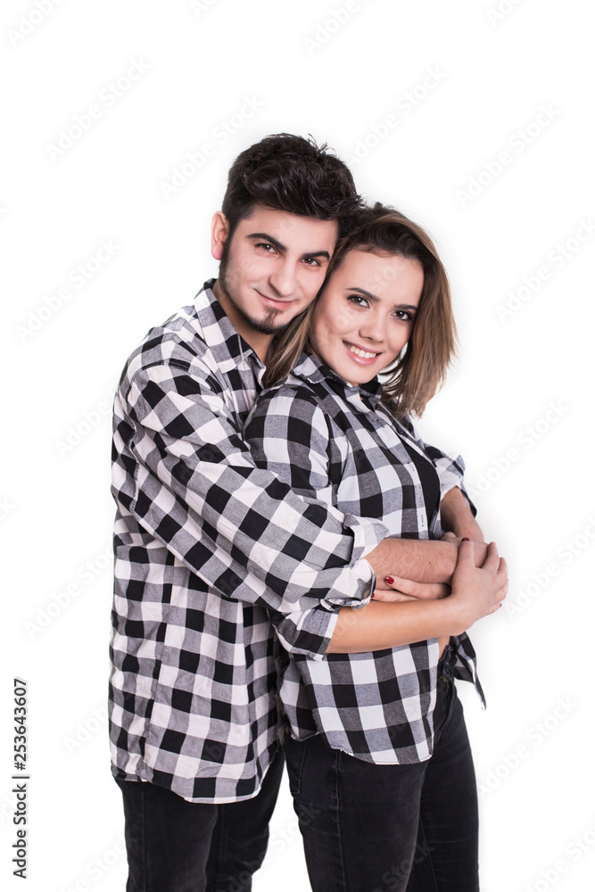 Happy young couple embracing each other isolated on white Happy young couple embracing each other isolated on white
