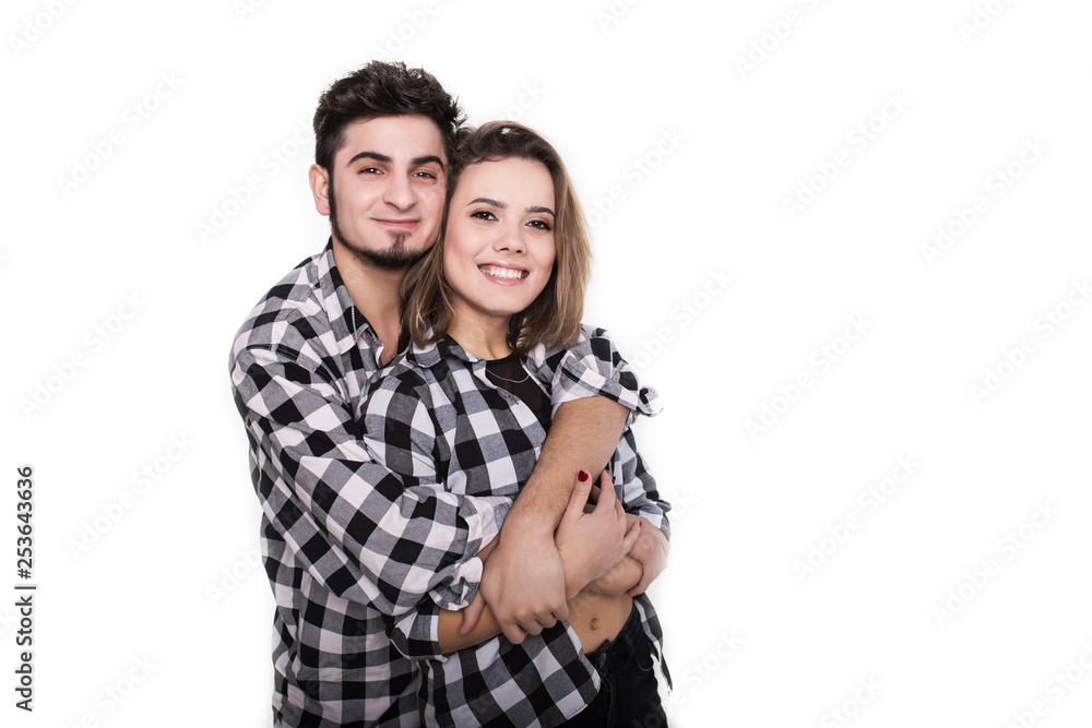 Happy young couple embracing each other isolated on white Happy young couple embracing each other isolated on white