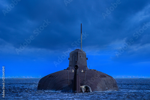 Military submarine on the water. Warship. Nuclear submarine. Navy. Weapon The defense of the state. Military conflicts. photo