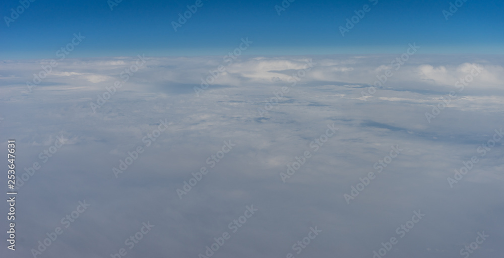 Netherlands, Hague, Schiphol, a plane flying in the sky Netherlands, Hague, Schiphol, a plane flying in the sky