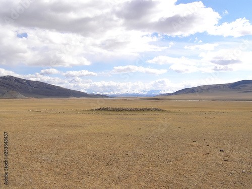 Mongolian natural landscapes surrounded by mountains and rocks.