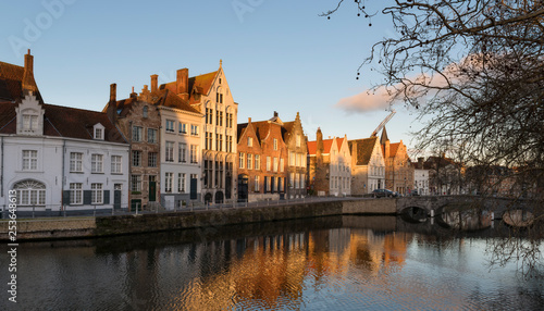 Brugge evening cityscape. Old buildings at water channel in Bruges  Belgium