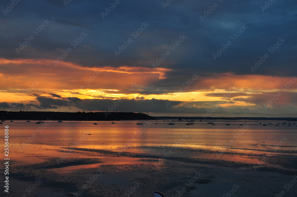 Sunset skies along Poole harbour in Dorset, England.