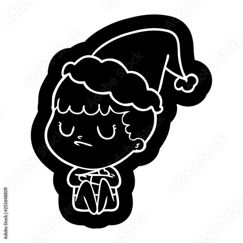 cartoon icon of a grumpy boy wearing santa hat