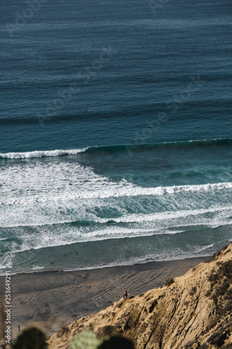 surfer on cliff