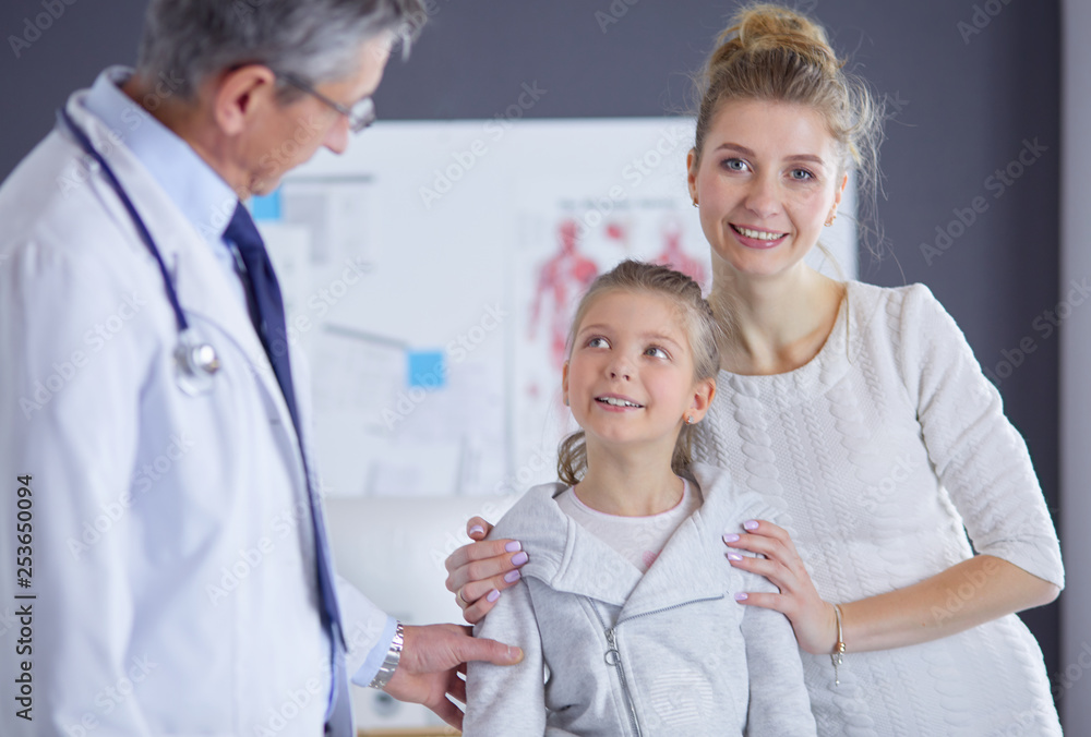 Little children with her mother at a doctor on consultation Little children with her mother at a doctor on consultation