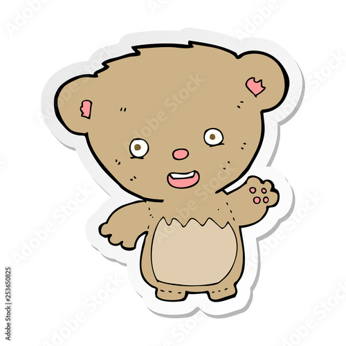 sticker of a cartoon teddy bear waving