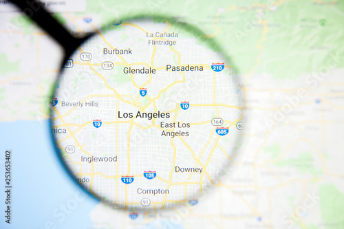 Los Angeles city visualization illustrative concept on display screen through magnifying glass