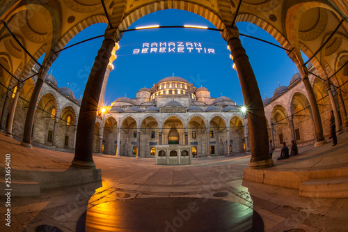 Istanbul,Turkey-July 8,2013; Suleymaniye Mosque Mahya of Abundance of Ramadan is written and hung between minarets of Suleymaniye Mosque. Mahya is to write with light especially during ramadan month. photo